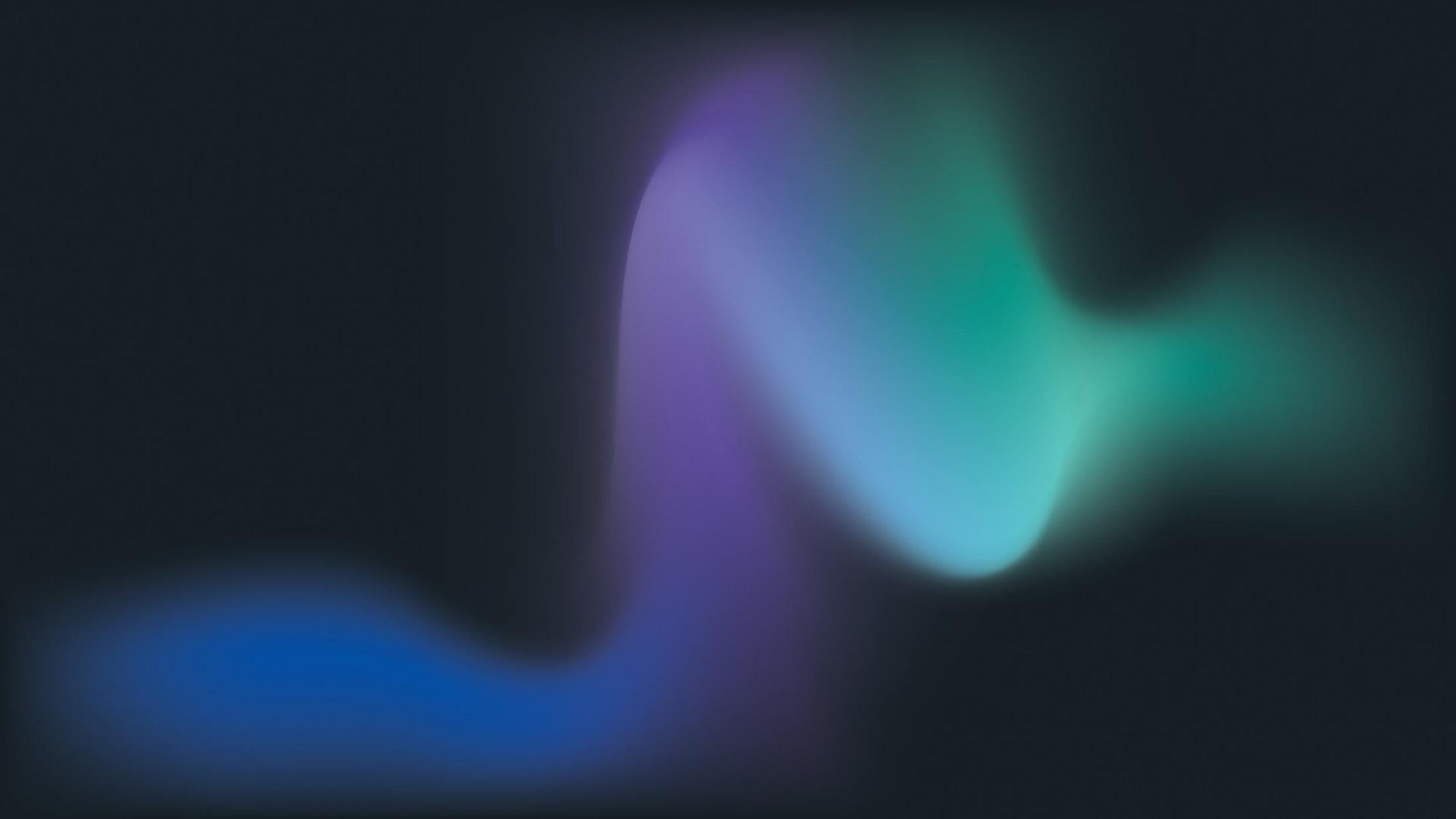 a blurry image of a blue and green light